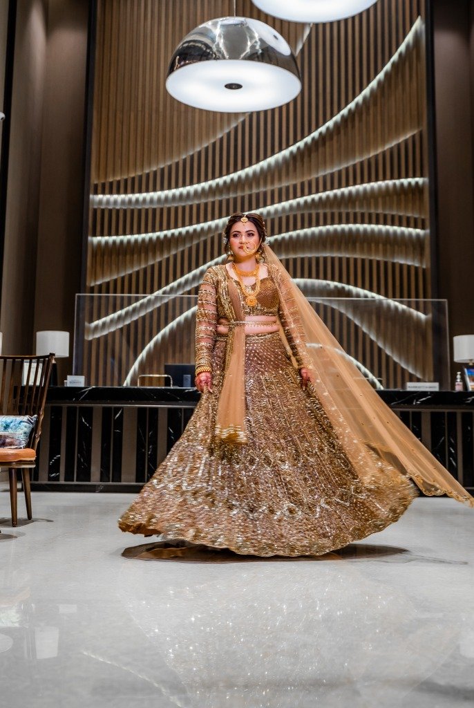 Golden Lehenga Hotel Lobby Twirl